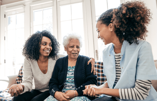 Family discussing assisted living options with Alpine Fireside staff in Rockford, IL